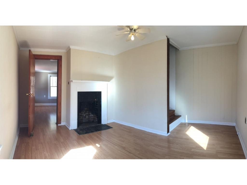 1333 Hampton Road Eden, NC 27288 - Photo 11 of 23 a open hall with a fireplace
