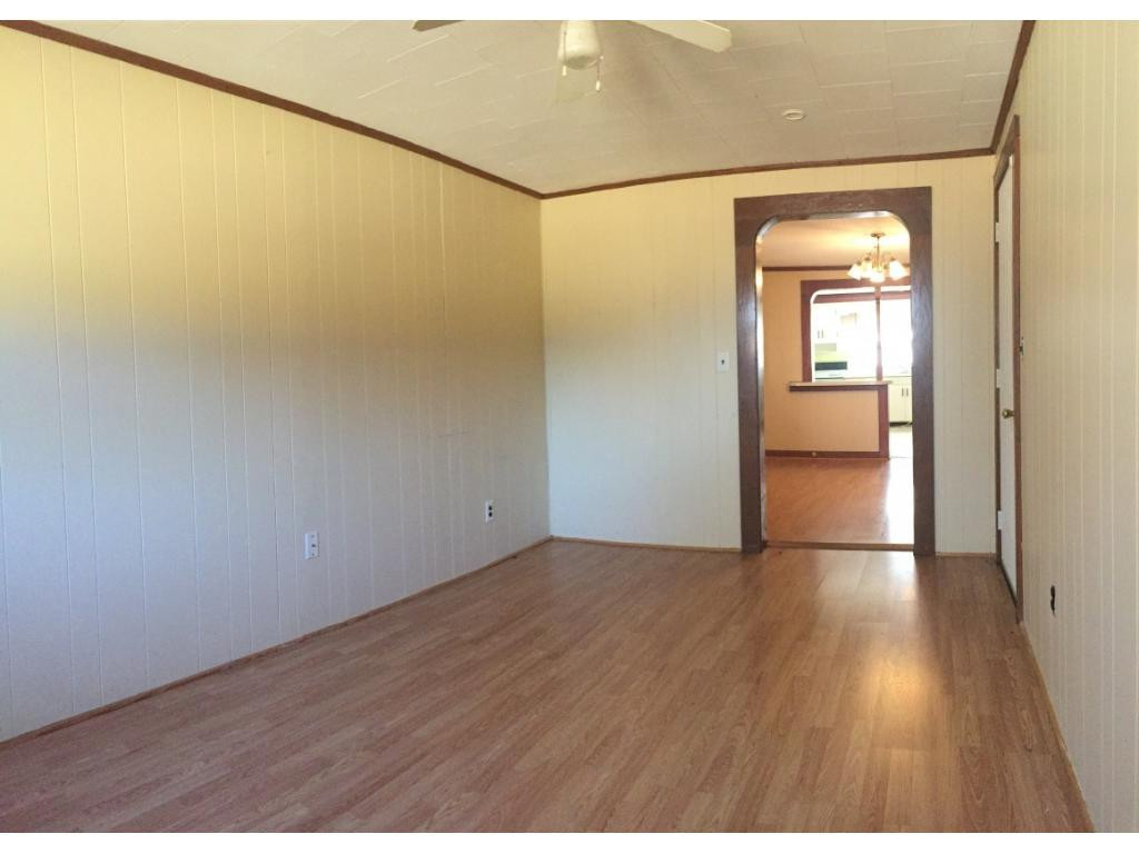 1333 Hampton Road Eden, NC 27288 - Photo 13 of 23 a view of a room with wooden floor and a gate
