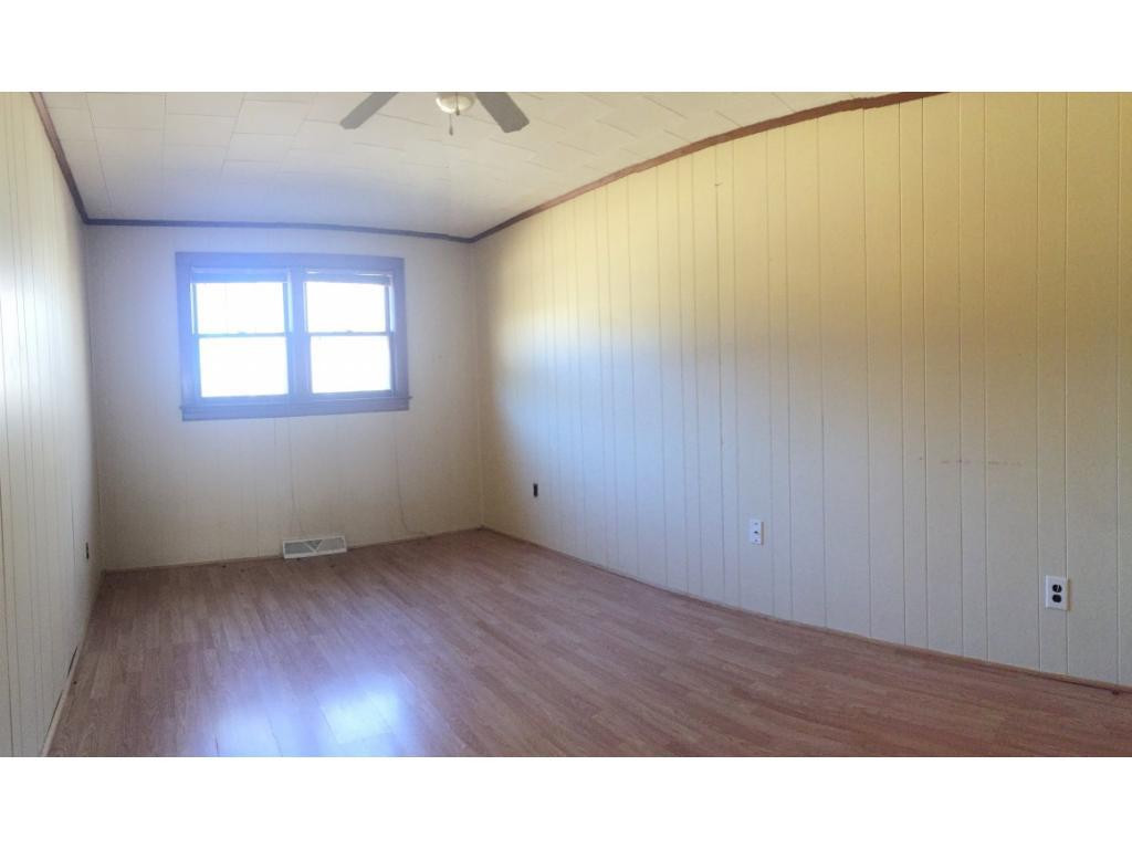1333 Hampton Road Eden, NC 27288 - Photo 14 of 23 a room with a window and wooden floor