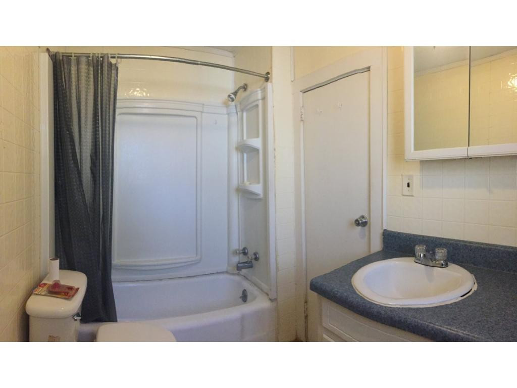 1333 Hampton Road Eden, NC 27288 - Photo 15 of 23 a bathroom with a sink double vanity and a mirror