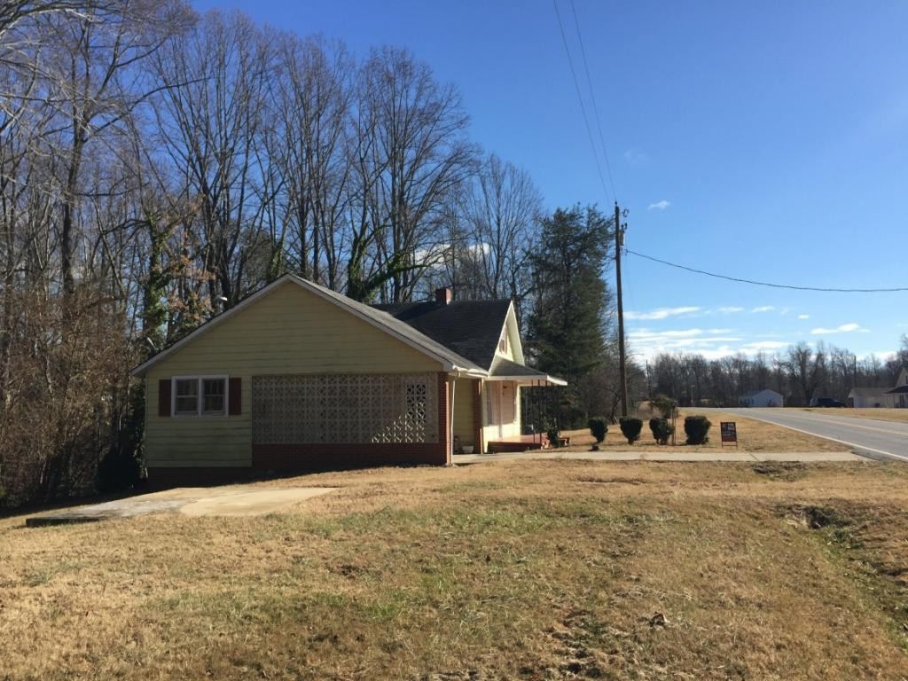 1333 Hampton Road Eden, NC 27288 - Photo 21 of 23 a front view of a house with a yard and garage