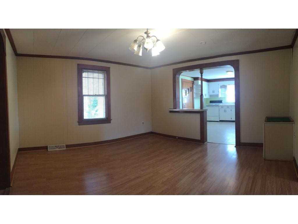 1333 Hampton Road Eden, NC 27288 - Photo 6 of 23 a room with a window and wooden floor