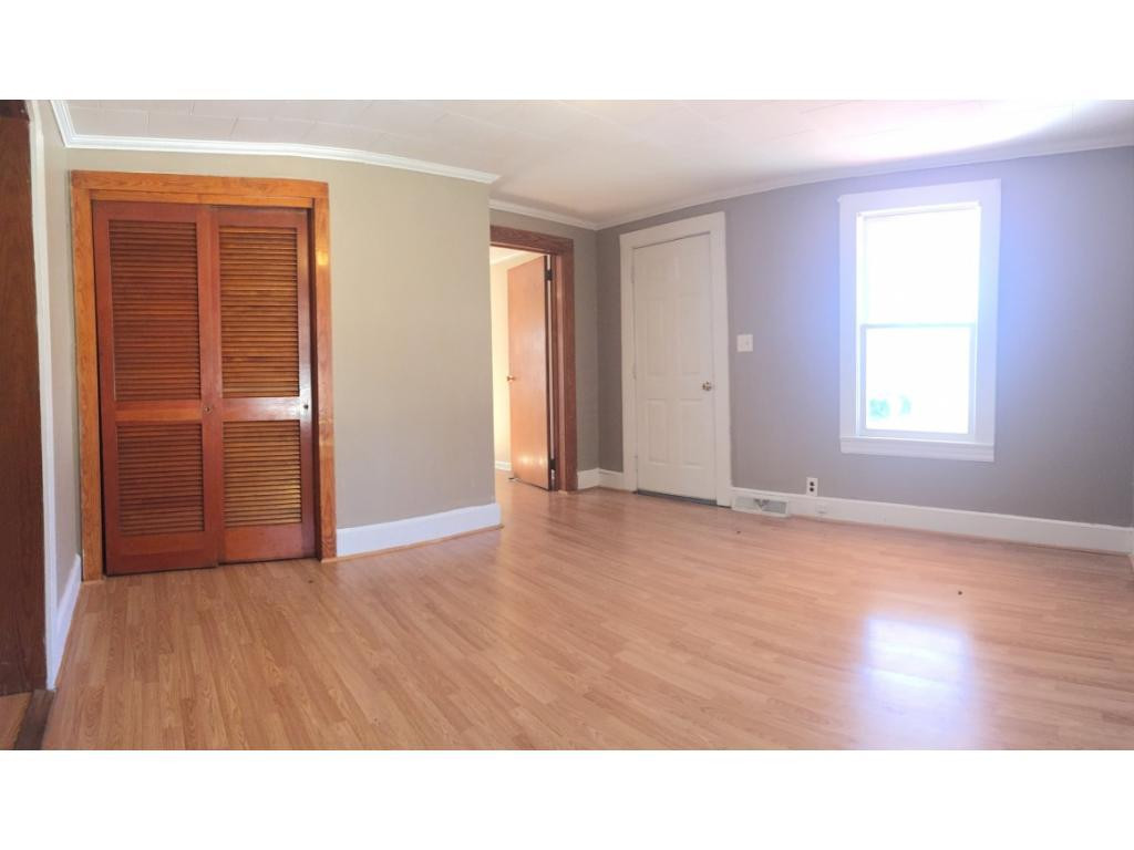 1333 Hampton Road Eden, NC 27288 - Photo 9 of 23 a room with wooden floor and windows