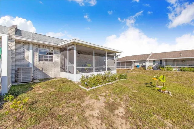 a view of front of house with a yard