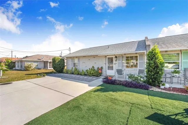 a front view of house with yard