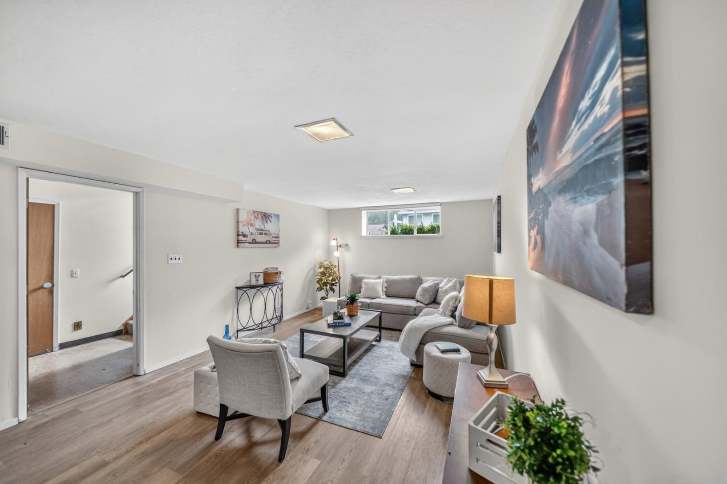 1287 Lerida Way Pacifica, CA 94044 - Photo 41 of 52 a living room with furniture and wooden floor