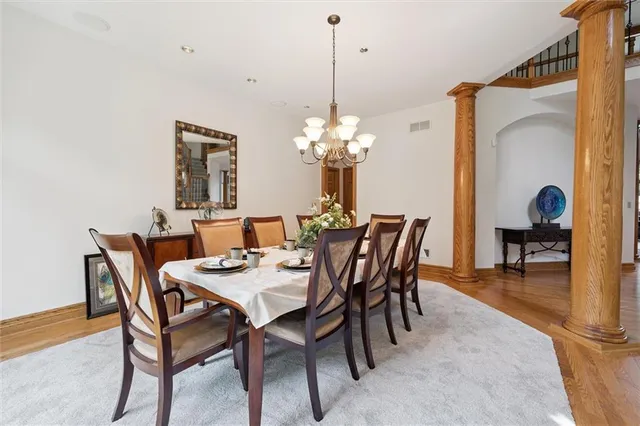 a spacious bathroom with a large tub a shower and view