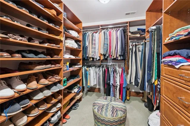 a kitchen with stainless steel appliances granite countertop a sink and stove