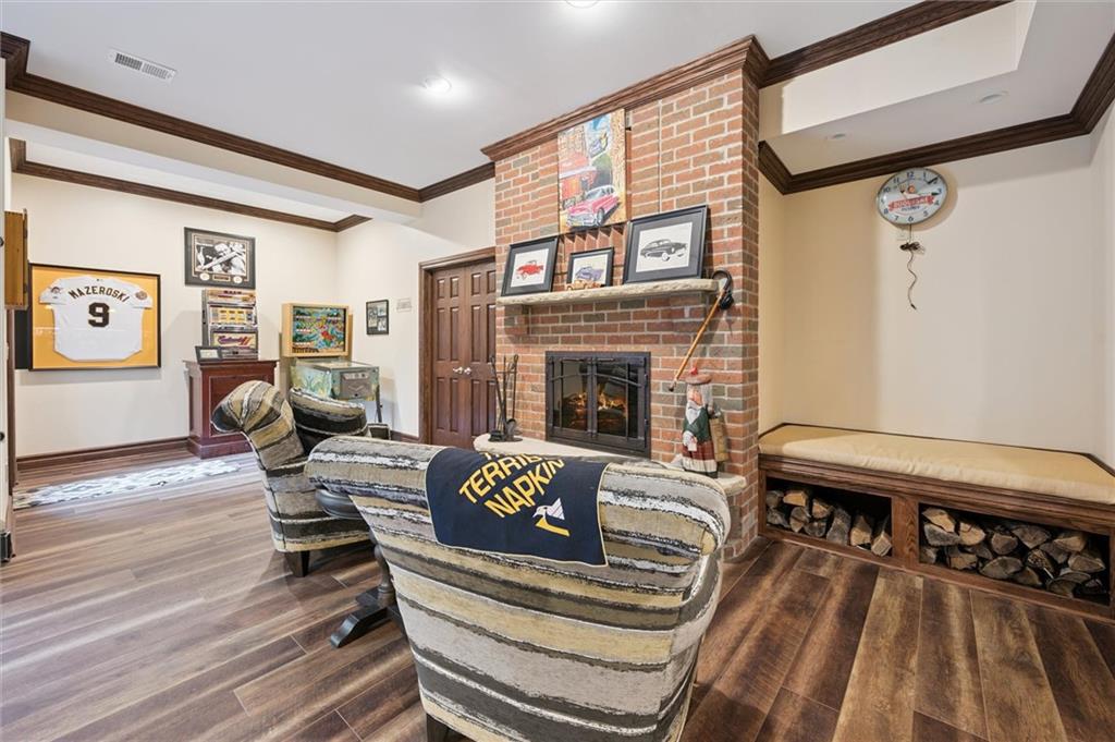 1653 Chapel Ridge Mars, PA 16046 - Photo 34 of 50 a living room with furniture and a fireplace