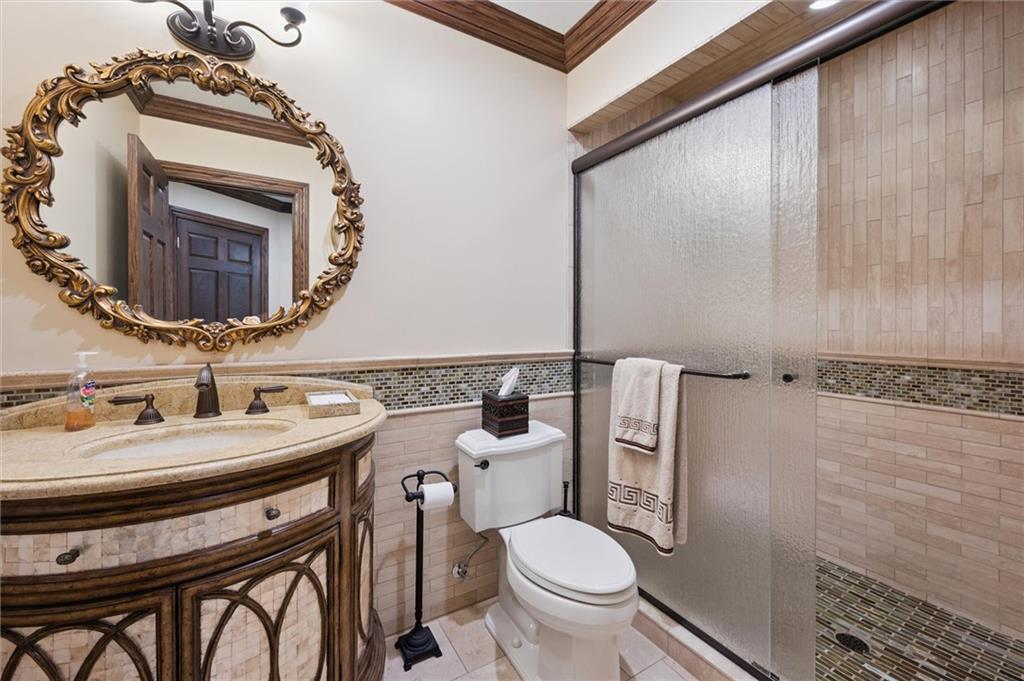 1653 Chapel Ridge Mars, PA 16046 - Photo 40 of 50 a bathroom with a sink a toilet and mirror
