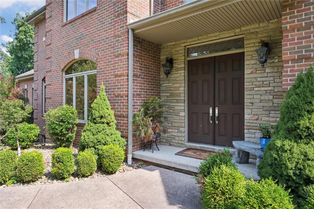 1653 Chapel Ridge Mars, PA 16046 - Photo 4 of 50 a front view of a house with a garden