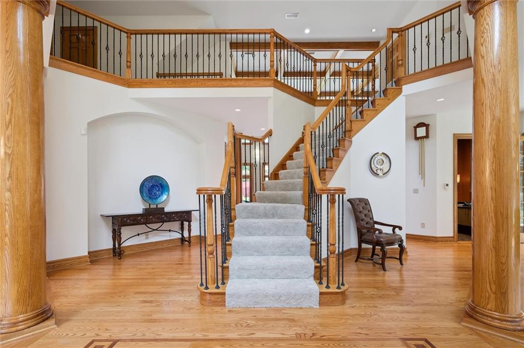 1653 Chapel Ridge Mars, PA 16046 - Photo 6 of 50 a view of entryway dining room and hall with wooden floor