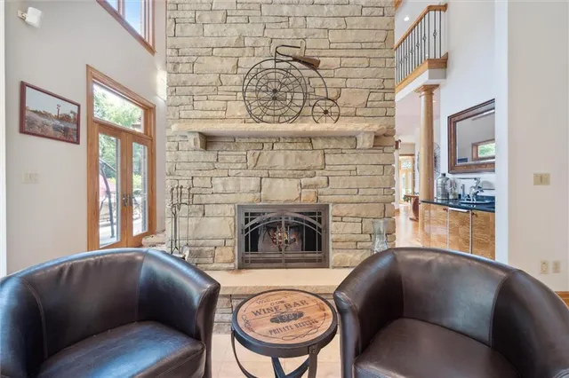 a kitchen with stainless steel appliances granite countertop a sink and a stove