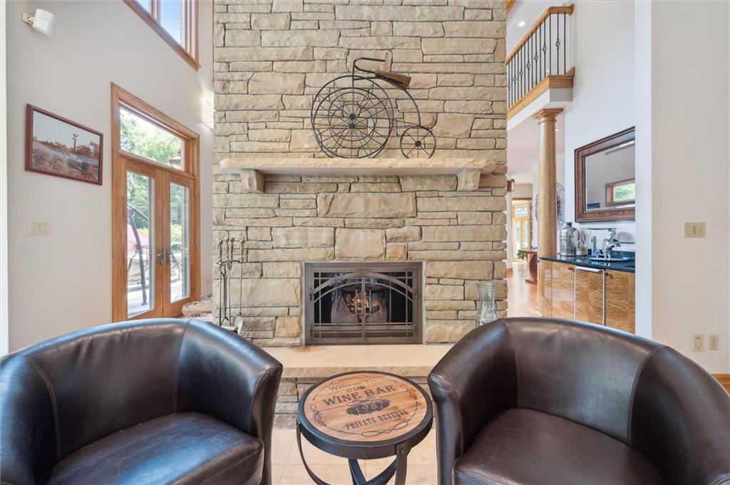 1653 Chapel Ridge Mars, PA 16046 - Photo 9 of 50 a living room with furniture and a fireplace