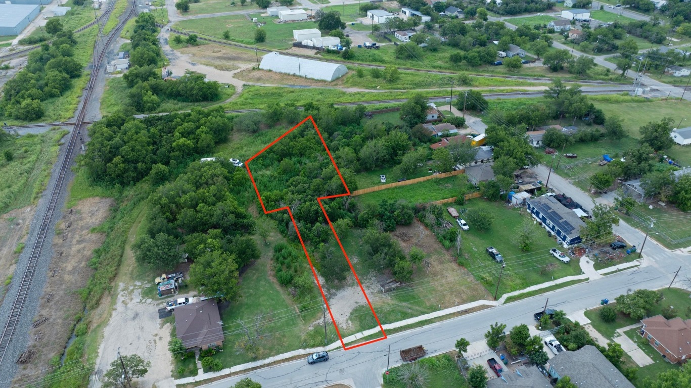 107 North Robinson Street Taylor, TX 76574 - Photo 3 of 5 an aerial view of lake