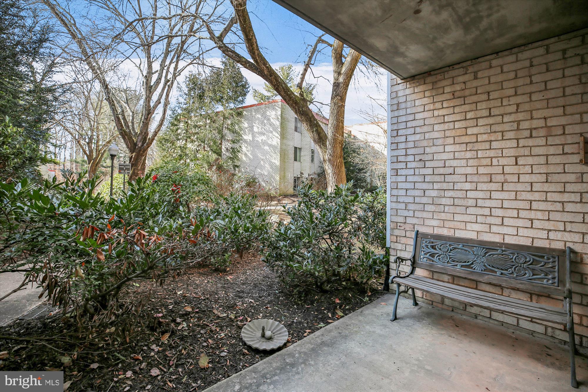 14410 Parkvale Road, Unit 2 Rockville, MD 20853 - Photo 19 of 37 a view of a bench in a yard