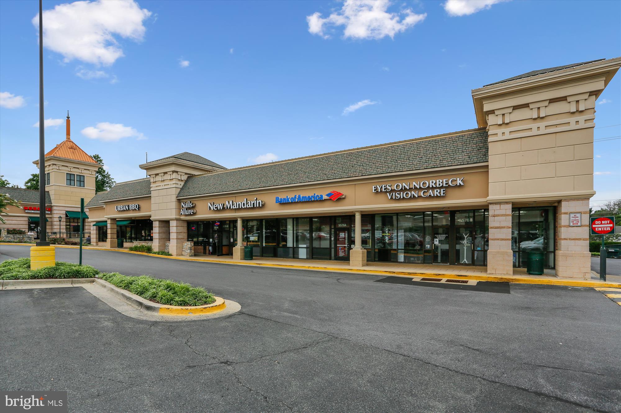 14410 Parkvale Road, Unit 2 Rockville, MD 20853 - Photo 27 of 37 a view of a building with a garden