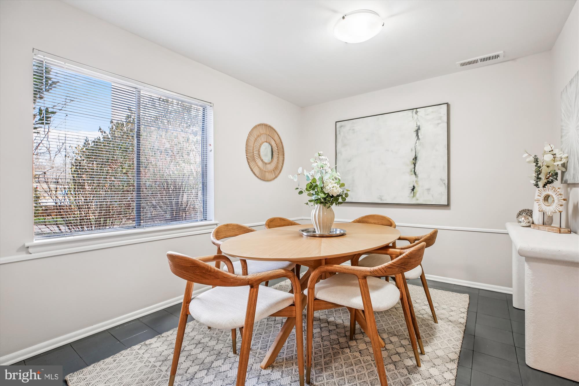 14410 Parkvale Road, Unit 2 Rockville, MD 20853 - Photo 8 of 37 a view of a dining room with furniture and wooden floor