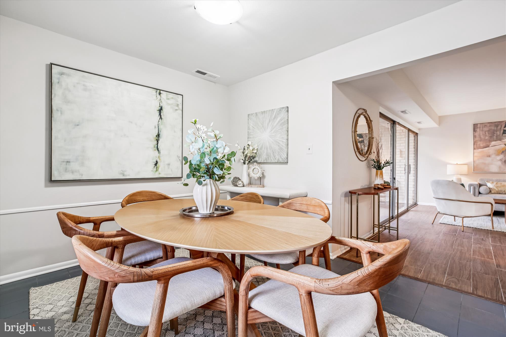 14410 Parkvale Road, Unit 2 Rockville, MD 20853 - Photo 9 of 37 a dining room with furniture and wooden floor