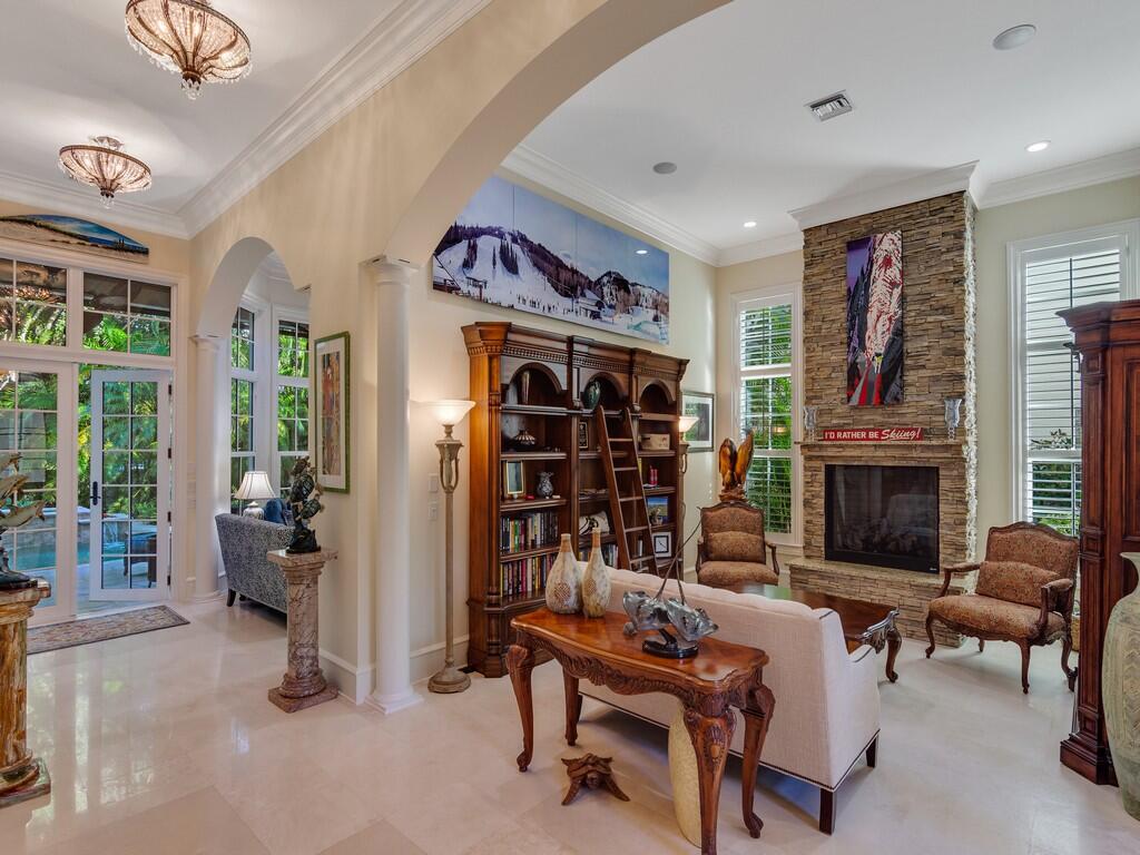 400 Oceanview Lane Vero Beach, FL 32963 - Photo 13 of 59 a living room with fireplace furniture and a fireplace