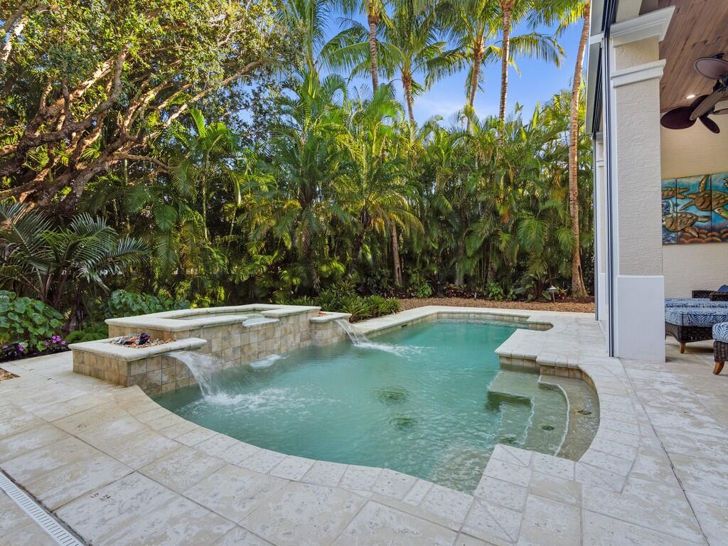 400 Oceanview Lane Vero Beach, FL 32963 - Photo 24 of 59 a view of a swimming pool with a patio