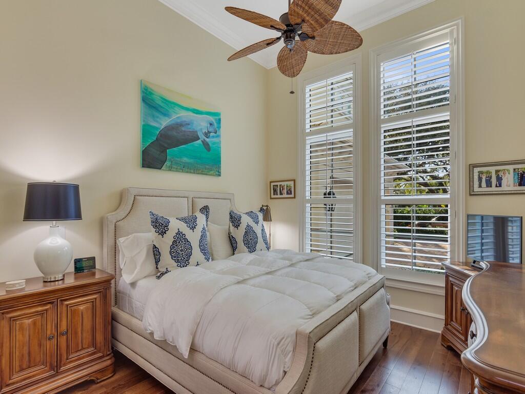 400 Oceanview Lane Vero Beach, FL 32963 - Photo 27 of 59 a bedroom with a large bed and a chandelier