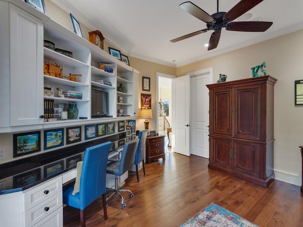 400 Oceanview Lane Vero Beach, FL 32963 - Photo 35 of 59 a view of a workspace with furniture and wooden floor