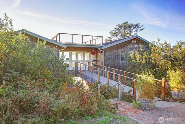 a view of a house with brick walls