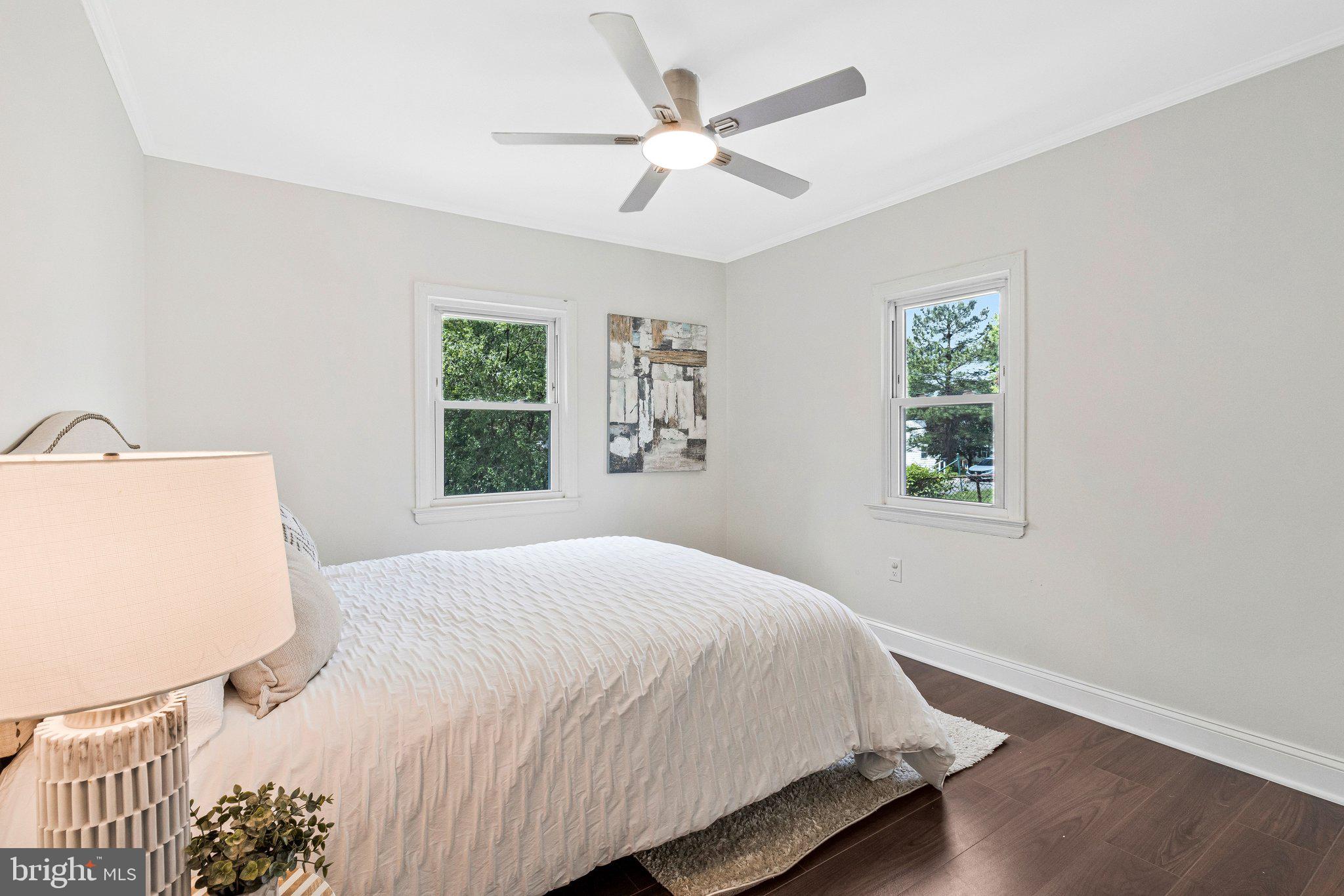 11515 Goodloe Road Silver Spring, MD 20906 - Photo 6 of 33 a bedroom with a bed and a window