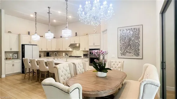 a view of a dining room with furniture