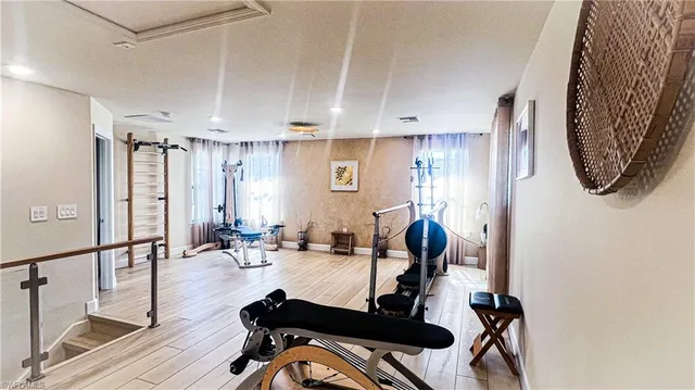 a view of a room with gym equipment
