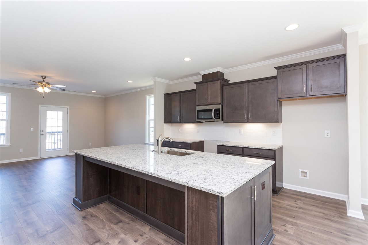 6121 Kayton Street, Unit 2192 Raleigh, NC 27616 - Photo 7 of 18 All photos are of a completed home of same plan and are or representational purposes only. Kitchen