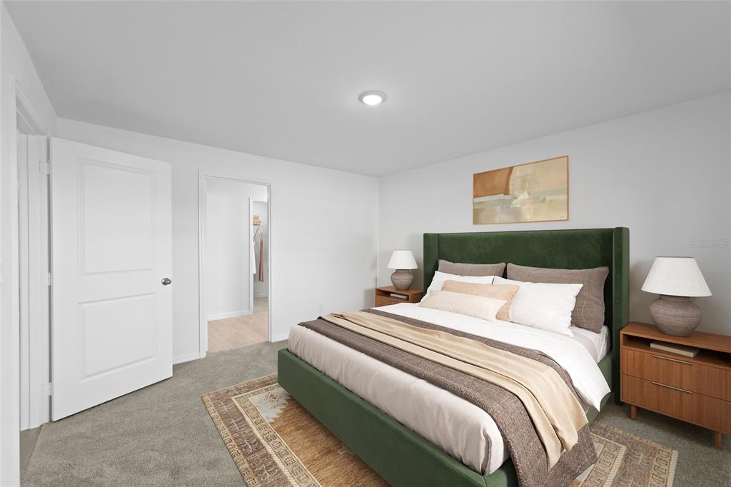 6285 Marcum Street Englewood, FL 34224 - Photo 10 of 15 a bedroom with a bed and a night stand