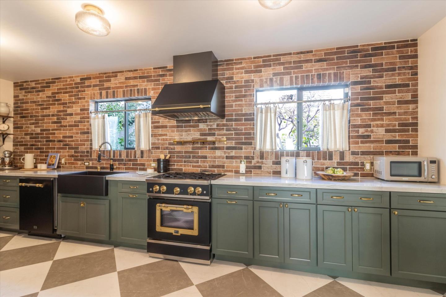 1821 Yale Drive Alameda, CA 94501 - Photo 14 of 74 a kitchen with stainless steel appliances granite countertop a stove a sink and a microwave