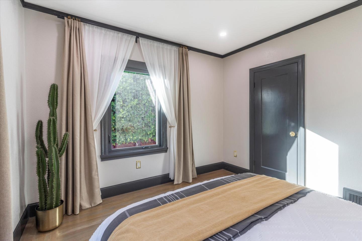 1821 Yale Drive Alameda, CA 94501 - Photo 28 of 74 a bedroom with a bed and a window