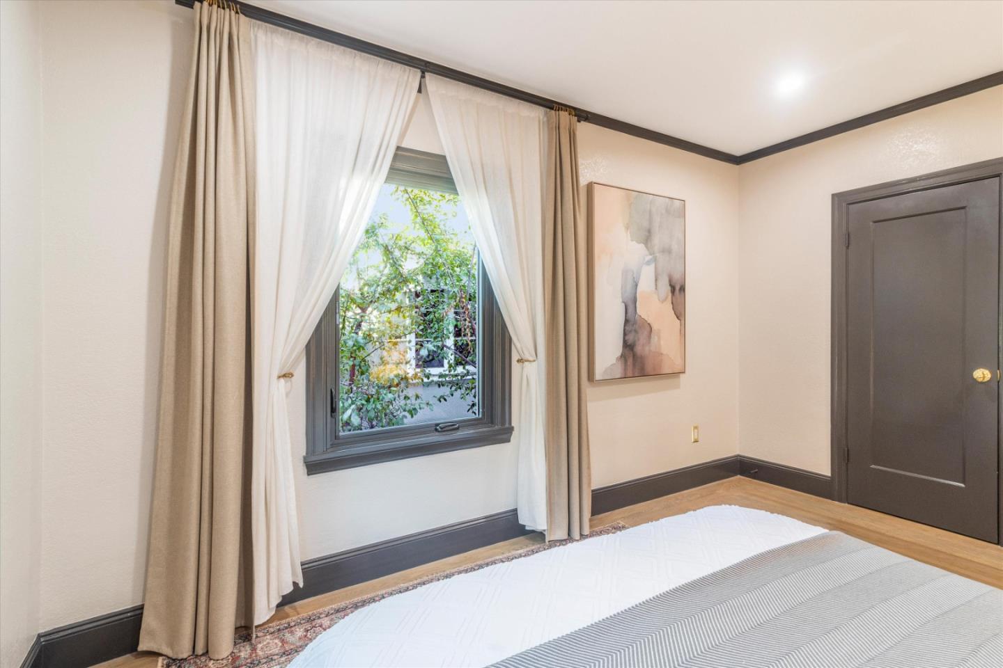 1821 Yale Drive Alameda, CA 94501 - Photo 32 of 74 a view of an empty room with wooden floor and a window