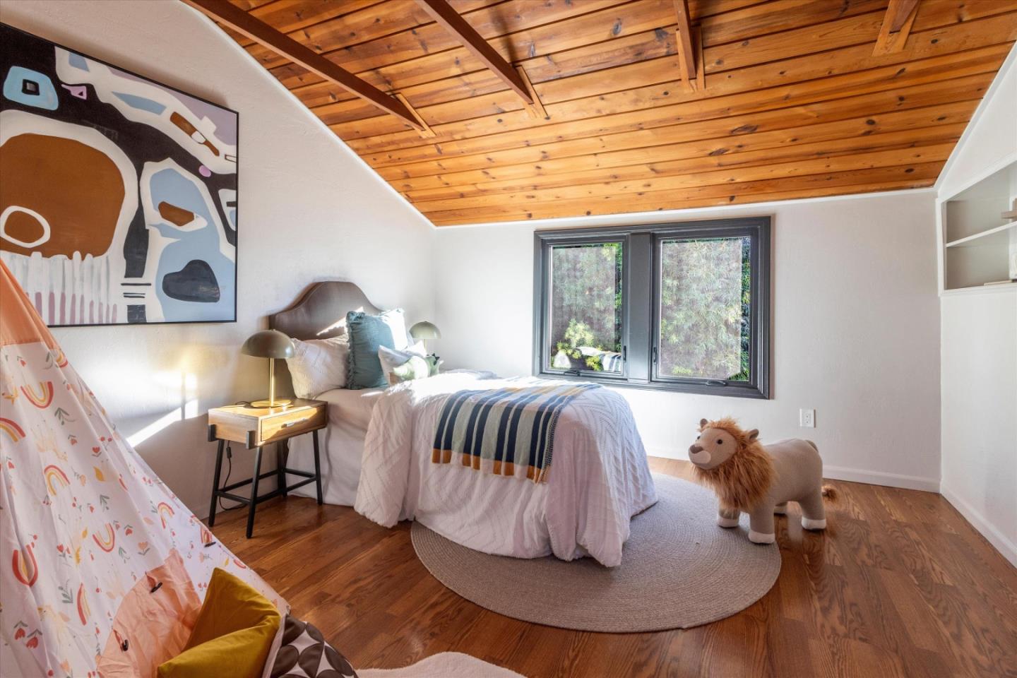 1821 Yale Drive Alameda, CA 94501 - Photo 35 of 74 a bed sitting in a bedroom next to a window