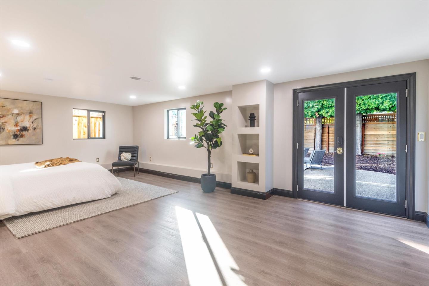 1821 Yale Drive Alameda, CA 94501 - Photo 37 of 74 a spacious bedroom with a large bed and a large window