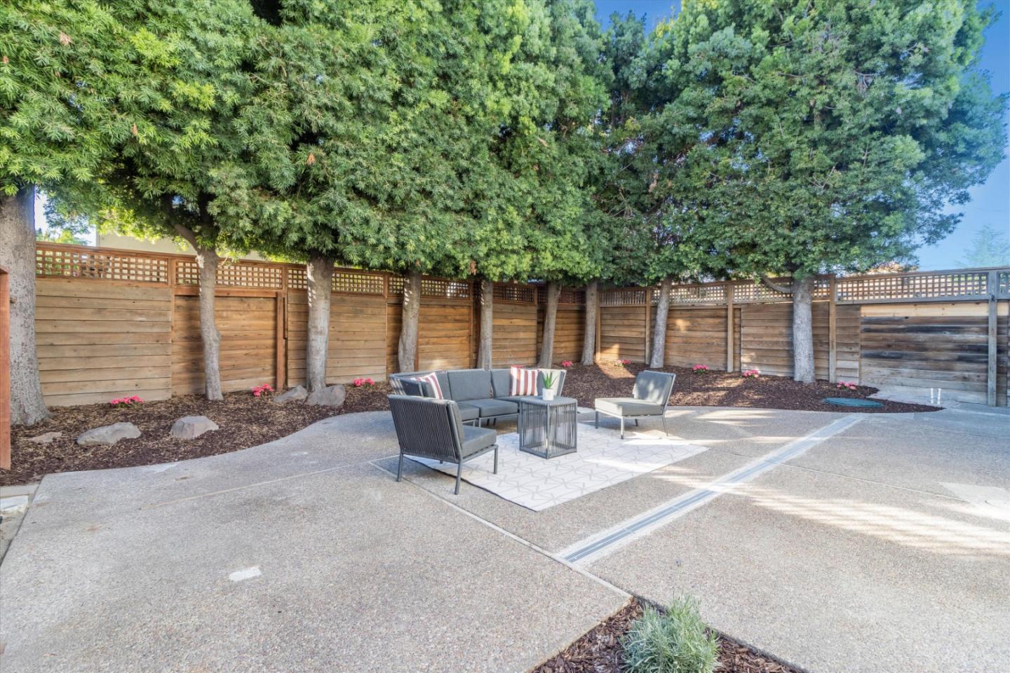 1821 Yale Drive Alameda, CA 94501 - Photo 39 of 74 a view of backyard with outdoor seating and plants