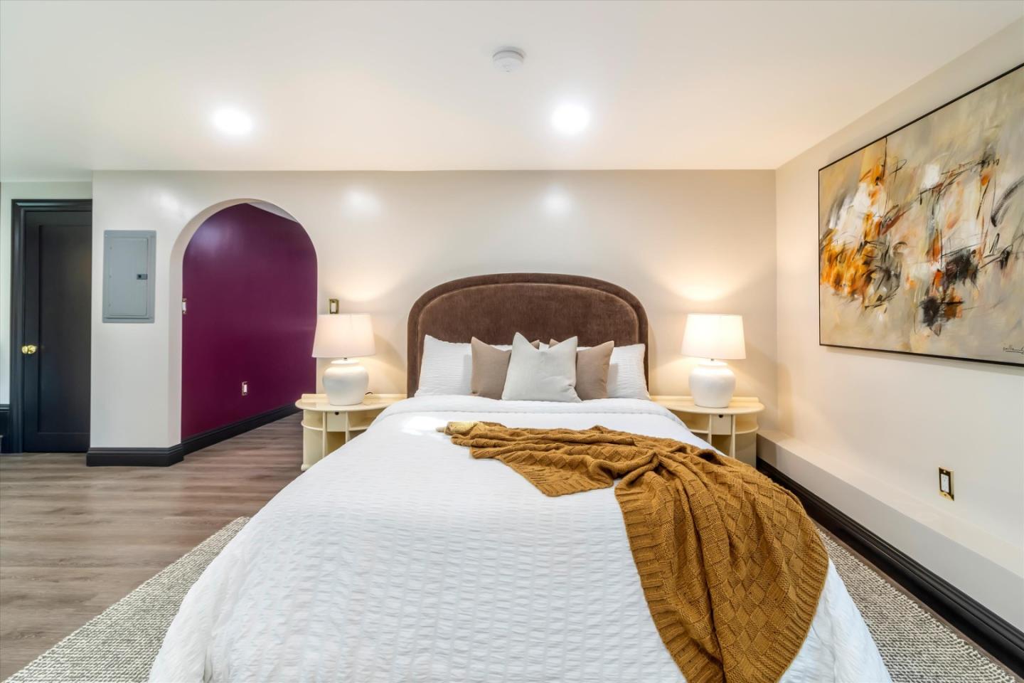 1821 Yale Drive Alameda, CA 94501 - Photo 40 of 74 a bedroom with a bed and a painting on the wall