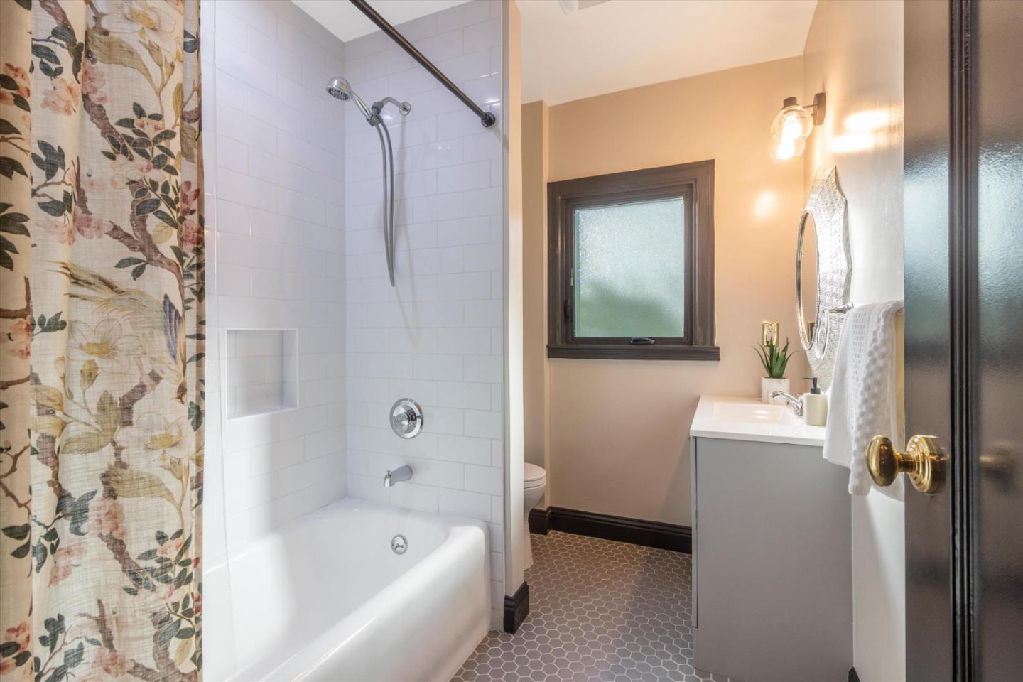 1821 Yale Drive Alameda, CA 94501 - Photo 50 of 74 a bathroom with a bathtub and shower