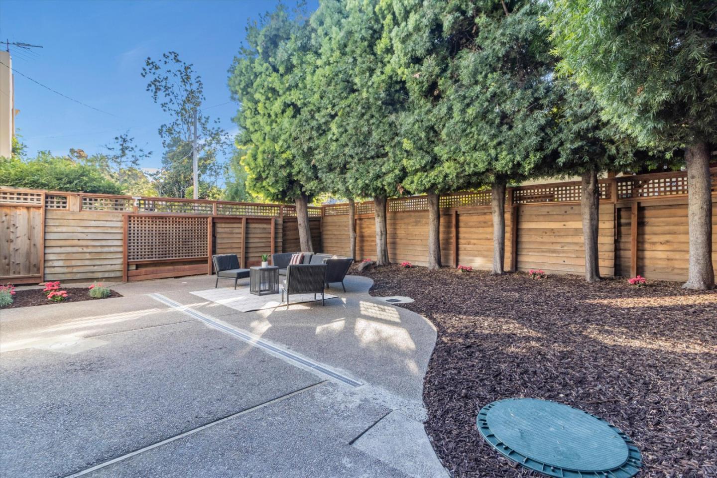 1821 Yale Drive Alameda, CA 94501 - Photo 6 of 74 a view of a backyard with a patio and outdoor seating
