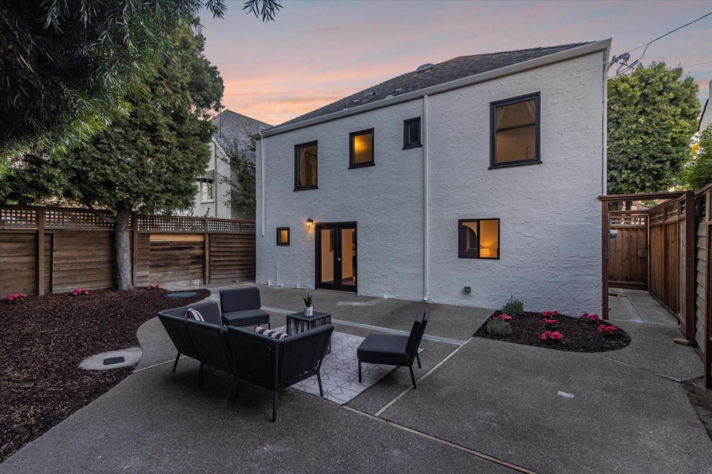 1821 Yale Drive Alameda, CA 94501 - Photo 61 of 74 a backyard of a house with table and chairs