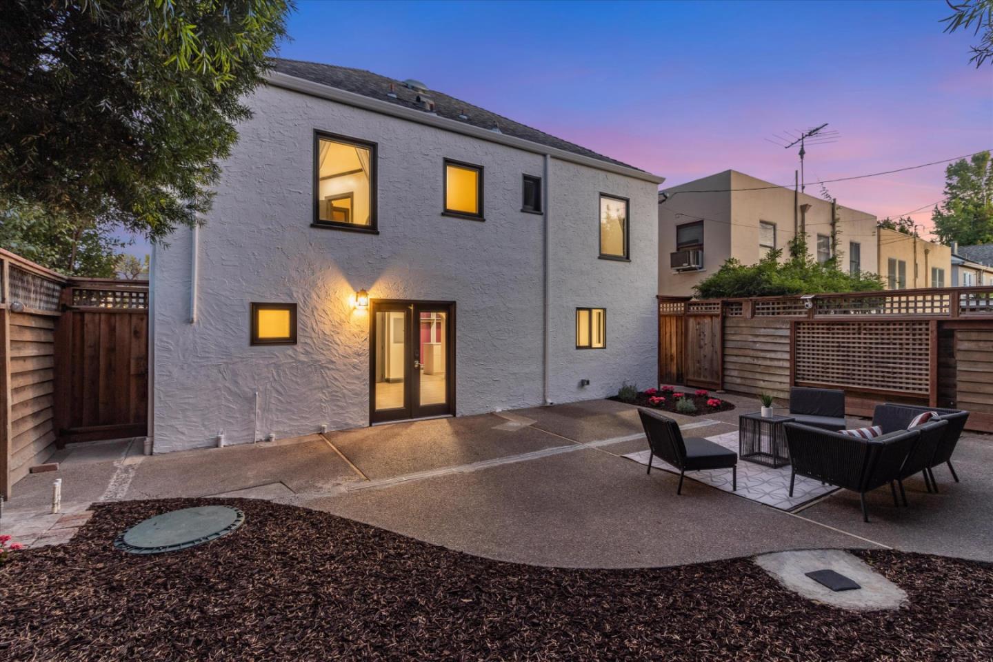 1821 Yale Drive Alameda, CA 94501 - Photo 70 of 74 a backyard of a house with yard fire pit and outdoor seating