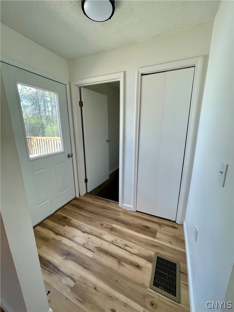 650 A E Road, Unit A De Peyster, NY 13654 - Photo 11 of 40 access to basement & deck