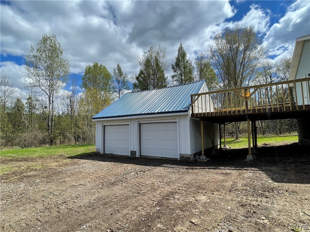 650 A E Road, Unit A De Peyster, NY 13654 - Photo 30 of 40 2 stall detached garage