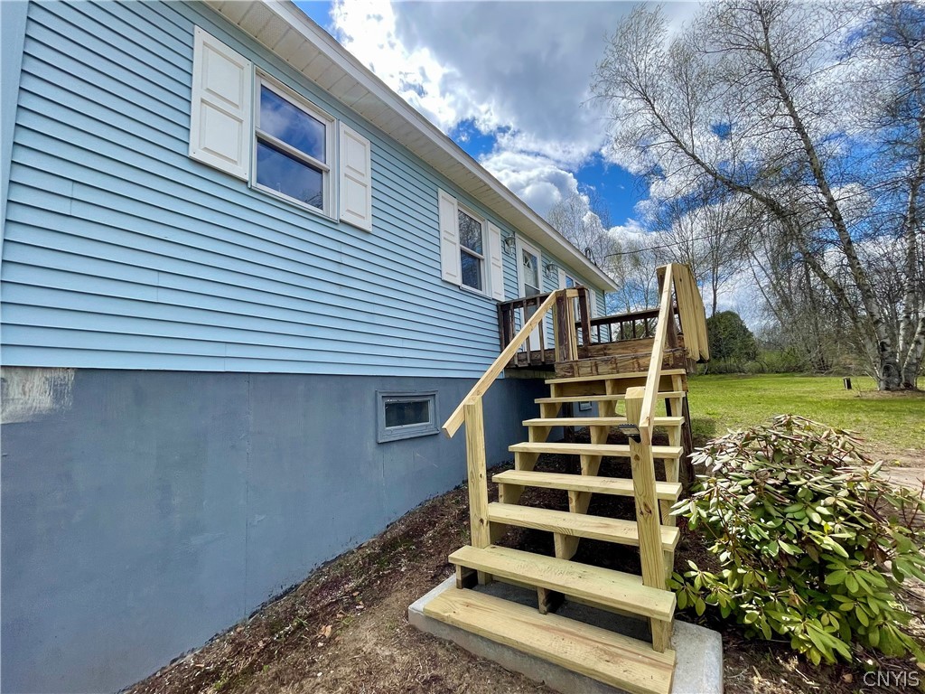 650 A E Road, Unit A De Peyster, NY 13654 - Photo 40 of 40 New pressure treated stairs