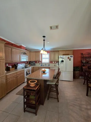 a kitchen with a cabinets and counter space