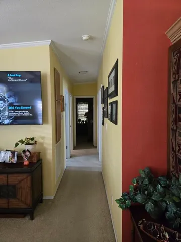a view of a hallway with closet