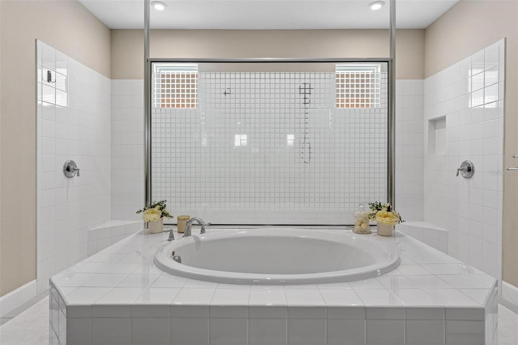 1235 Waterview Ridge Circle Apopka, FL 32703 - Photo 32 of 82 a bathroom with a sink a shower and a mirror